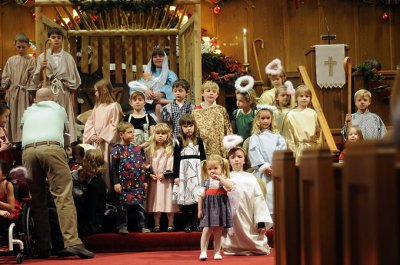 Costumed kids at the manger