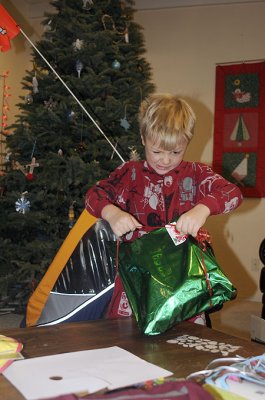Simon wrestles with gift wrap