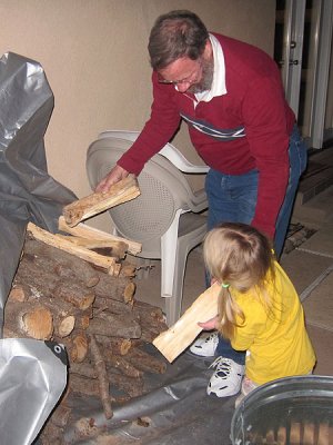 Kristina helps Grandaddy get firewood