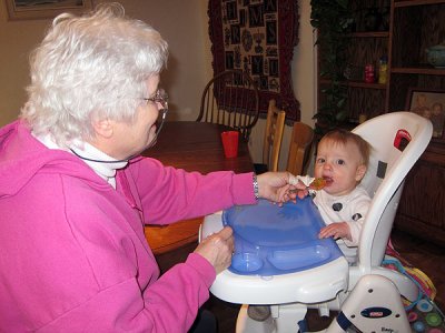 Nana feeds Annie
