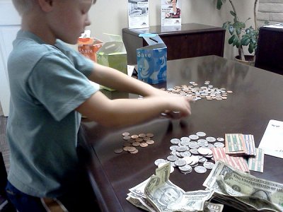 Simon counts out his money