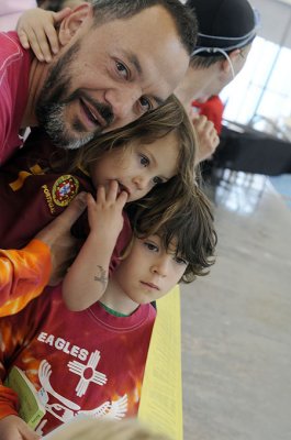 Anxious fans watch the swimmers