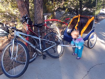 Annie checks the bikes and chariot