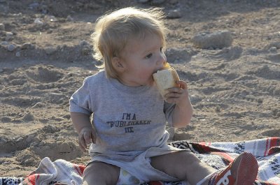 Annie gets right to work on the picnicking