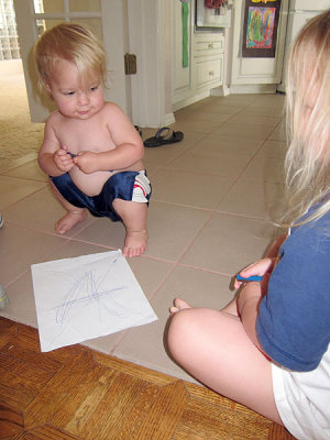 Kristina shows Annie how to draw