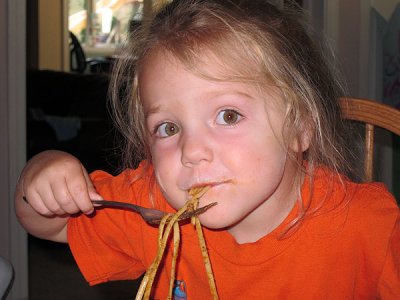 Kristina demonstrate proper noodle-eating technique