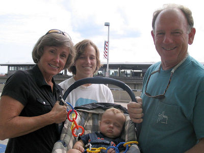 With Baba and Papa at the airport