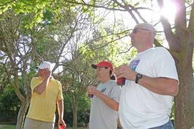 Team members relax at BBQ