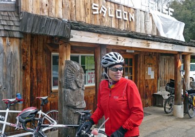 Peggy rests in front of the Mountain House Saloon at Badger