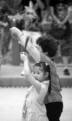 Girl with Grandmother at Wong Tai Sin Temple