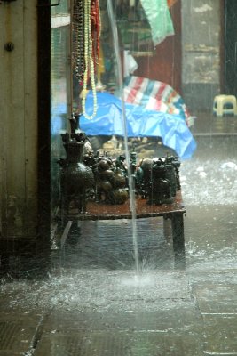 The antiques market in the rain.