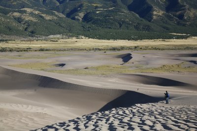 A Photographer On The Dunes
