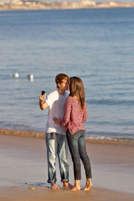 Kissing by the seaside