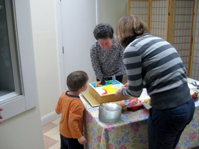 Birthday Boy Examines Wizard of Oz Cake.jpg