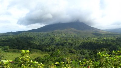 Clouds obscure the peak of Arenal