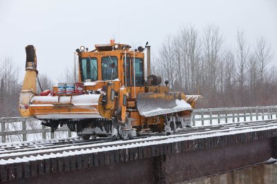 Snow removal equipment on bridge