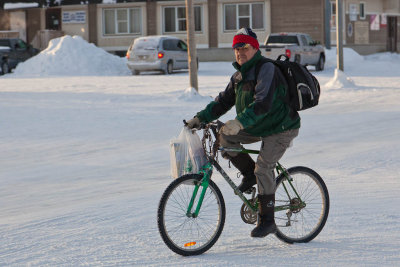 Man on bicycle on First Street 2012 February 3rd