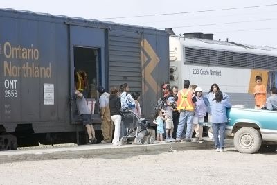 Unloading boxcar 2556 in Moosonee 2006 July 7