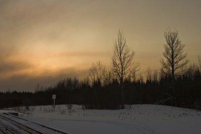 Cloudy sunset from near rail bridge