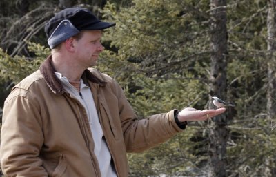 Brian with a Black-capped Chickadee