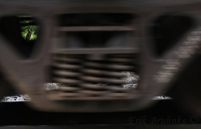 Train wheels passing by the base of the La Crosse bluffs