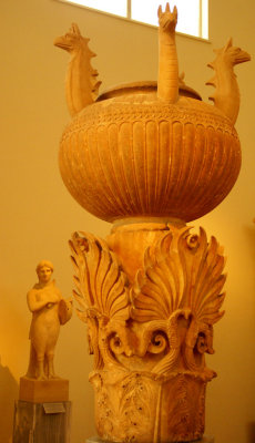 Exquisitely hand crafted vessel with designs from the Hellenic era..