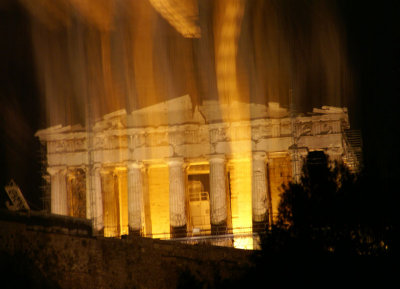 The Parthenon illuminated at night, with a special effect halo courtesy of the photographer.