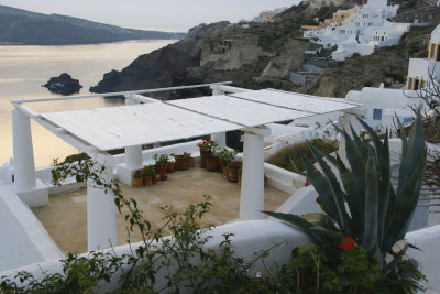 Porch with elaborate stairway in Oia.