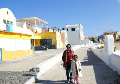 Visitors in Oia enjoying the well appointed paths into the village.