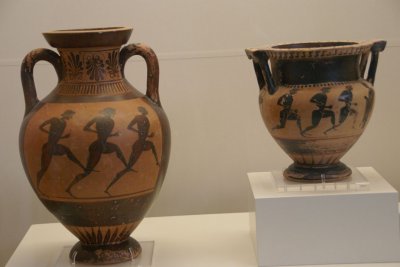 Ceramic pots with ornate motifs of track and field events from the ancient Olympic games.