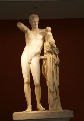Hermes, one of the earliest Greek Gods as protector of the child Dionysos.