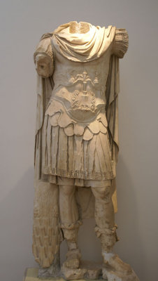 Well preserved headless sculpture of a Roman General in pentelic marble.