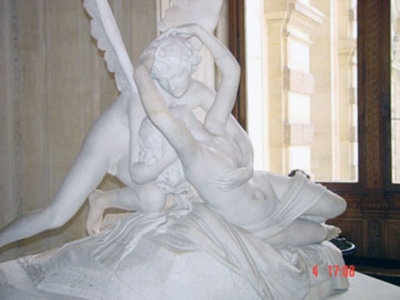 Exquisite amorous sculpture within the Louvre.