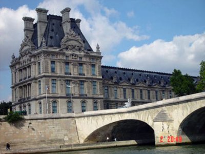 The Louvre as seen from the Bateaux Bus on the river Seine.