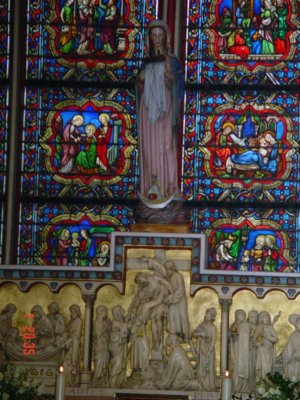 Breathtaking sculpture and stained glass designs adorn the interior of the Church of Notre Dame.
