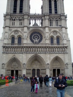 Flanked by L'Eglise de Notre Dame (The Church of Our Lady).