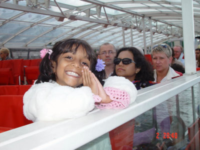 Happy Camper on the Bateaux Bus, on her voyage across the waterways of Paris.