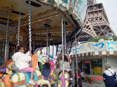 Uma on the Carousel in front of the Eiffel Tower.
