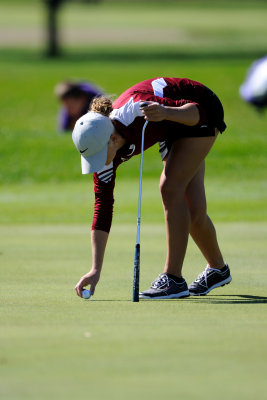 Chelsea placing her ball to putt on #3