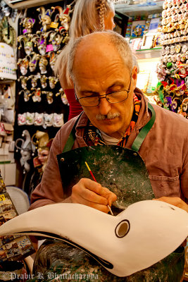 A mask artist at work, Venice