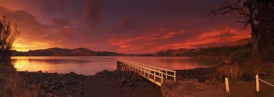 Panorama of Lyttelton Harbour at sunrise from Rapaki Jetty, Canterbury, New Zealand