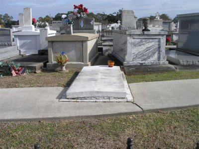 Grave  on sidewalk