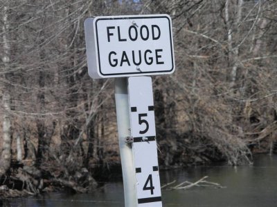 Several creeks have 5 ft flood gauge signs