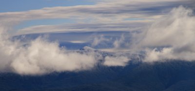 The Presidentials just beginning to peak through the clouds, Mt. Martha summit.