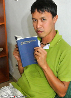 Cesar reading the Bible at Hostal My Home Panama