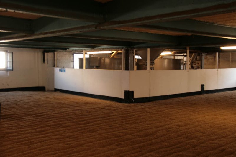 Inside the Bowmore Distillery - the malting hall where the barley is spread on the floor and allowed to germinate