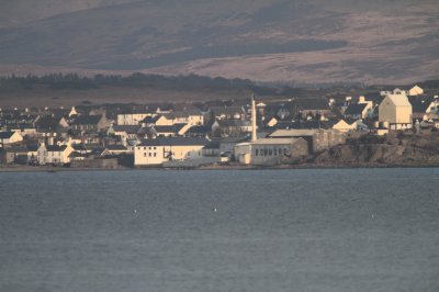 The town of Bowmore and the Distillery from Bruichladdich across Loch Indaal