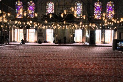 The carpeted floor and low level lighting in the Blue Mosque, Istanbul