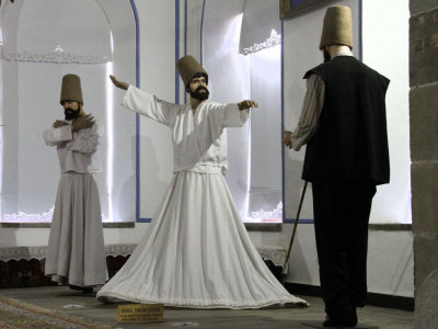 Mannequins of Dervishes observing the sema ritual, the Mevlna Museum in Konya