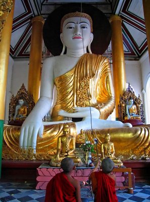 Buddha being fanned